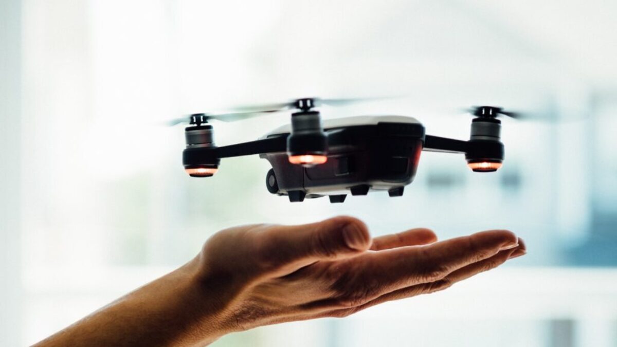 turned on black quadcopter drone