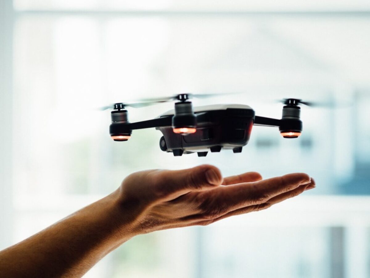 turned on black quadcopter drone