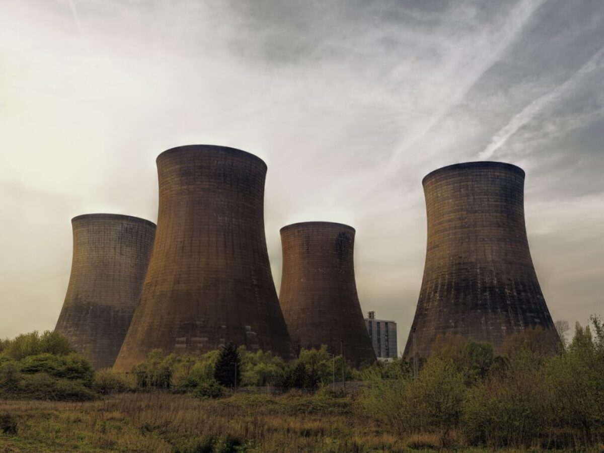 four brown concrete towers
