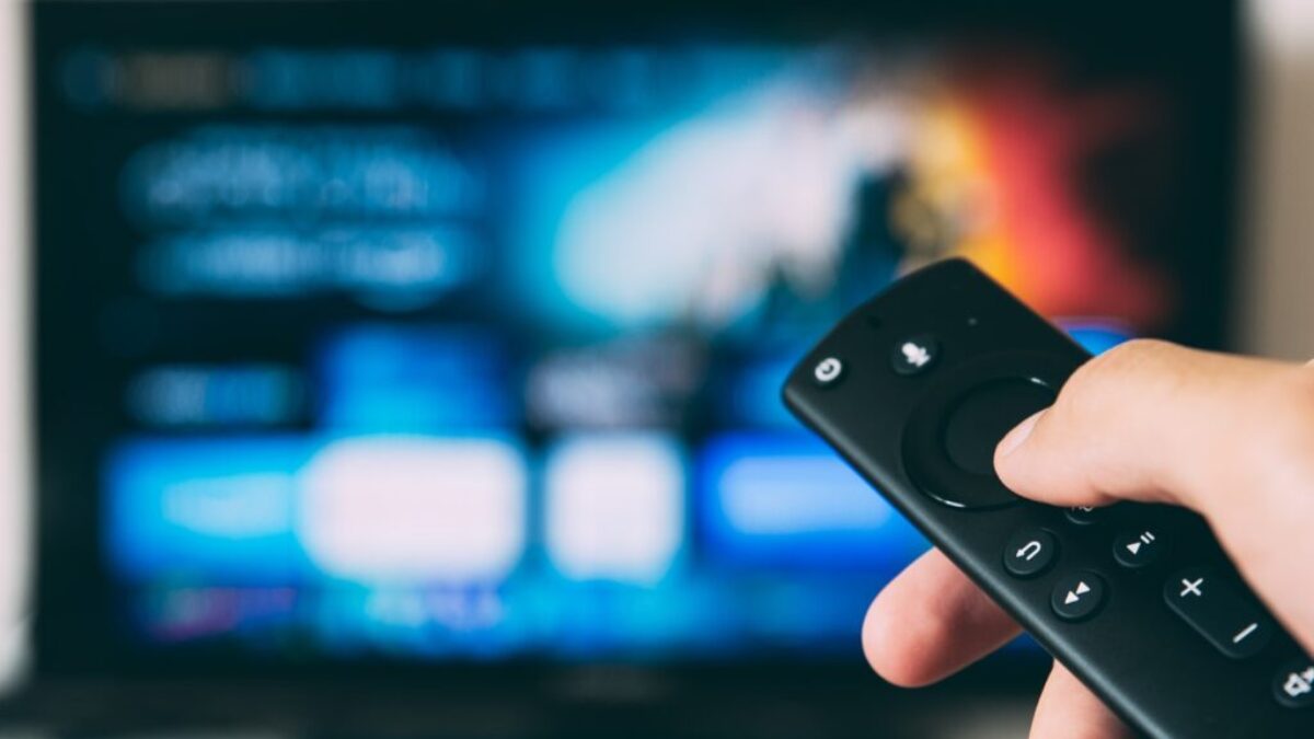 turned-on flat screen television