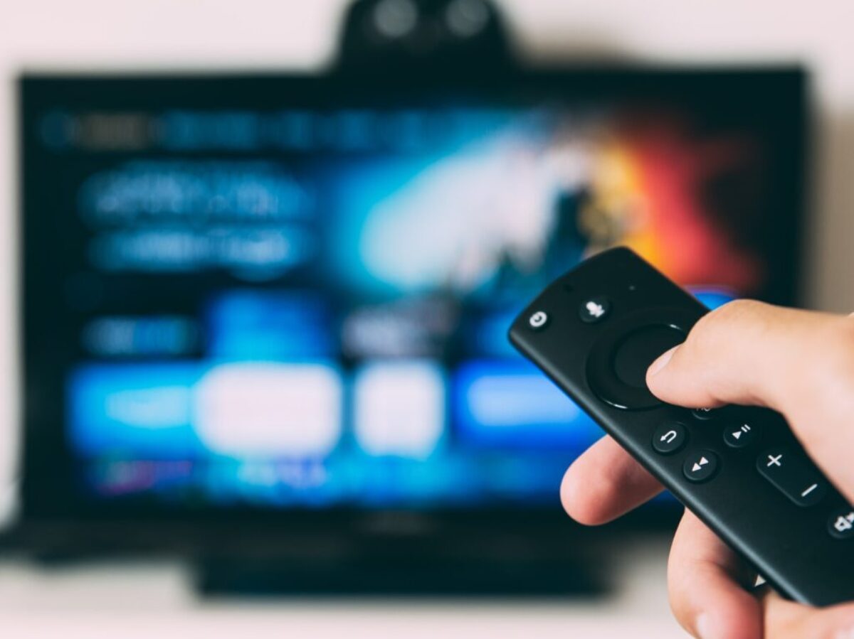 turned-on flat screen television