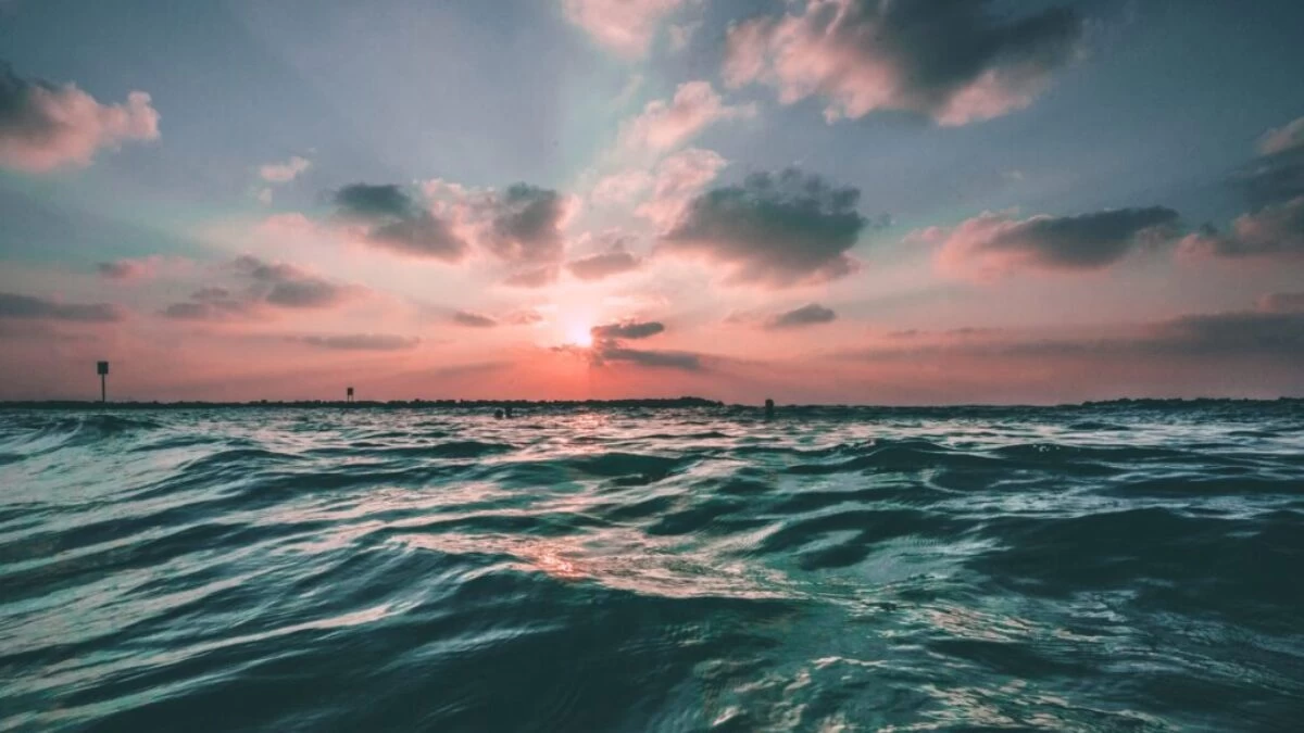 body of water during golden hour