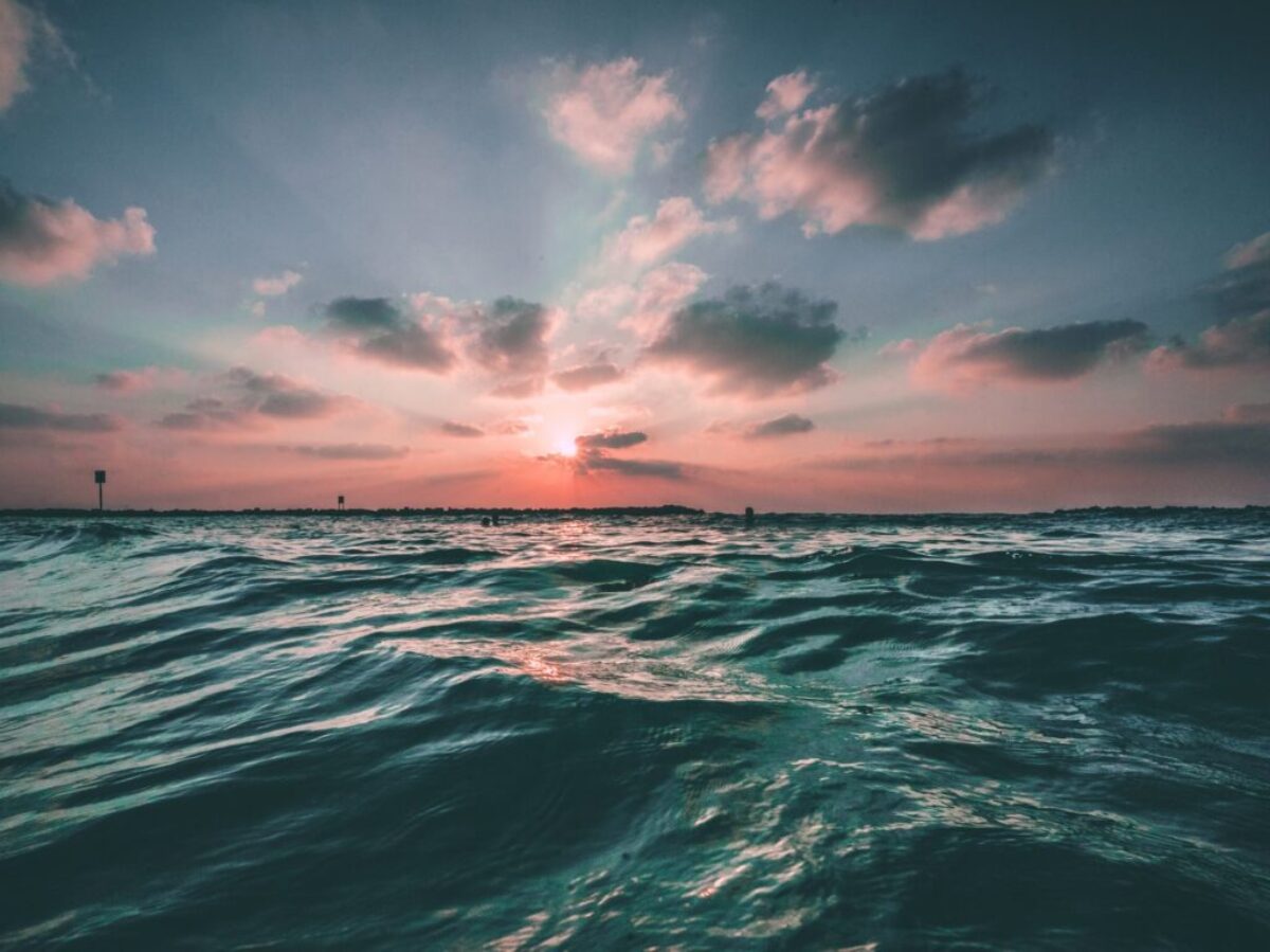 body of water during golden hour