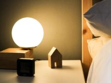 black digital alarm clock at 11 00