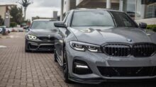 black bmw m 3 parked on brown brick floor