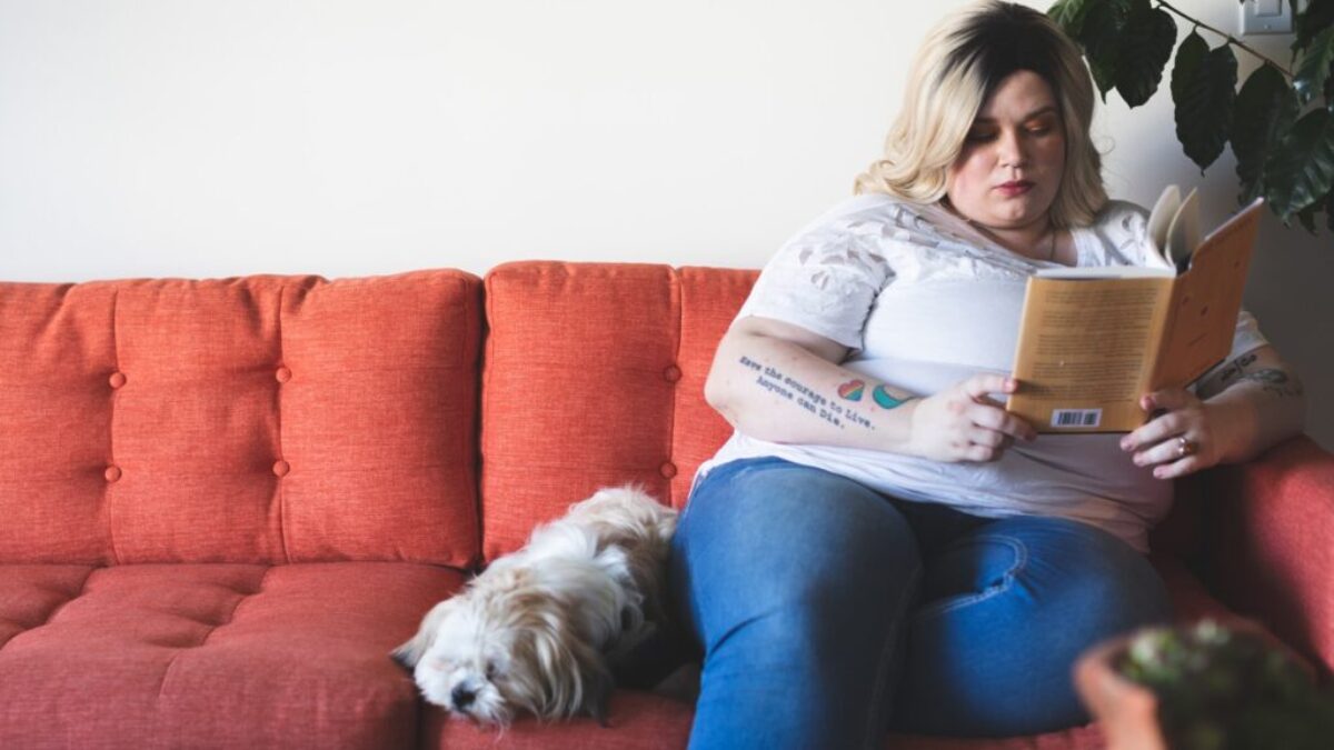 woman sitting on sofa