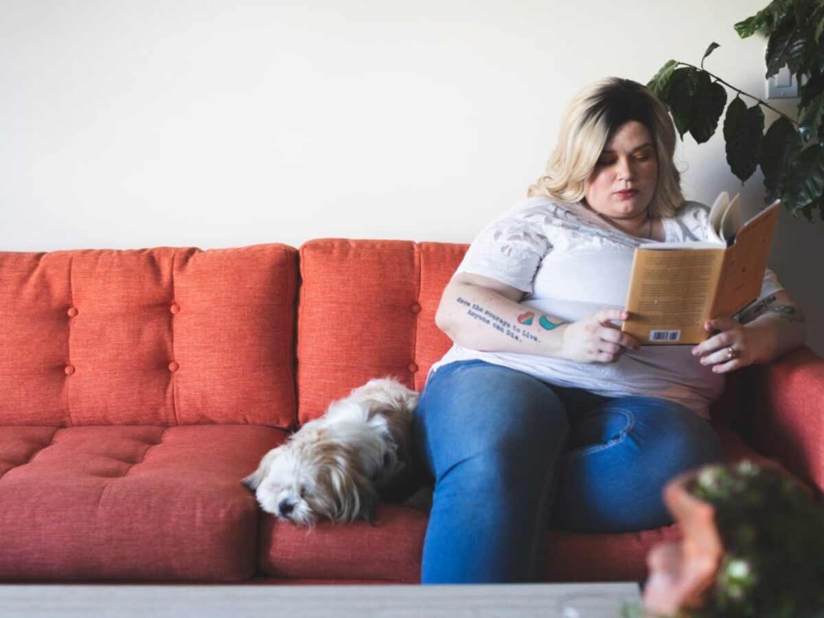 woman sitting on sofa