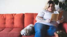 woman sitting on sofa