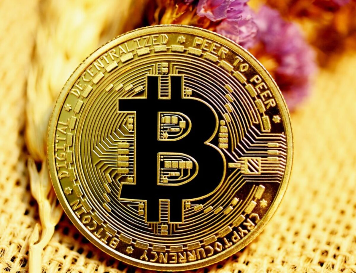 gold and black round coin