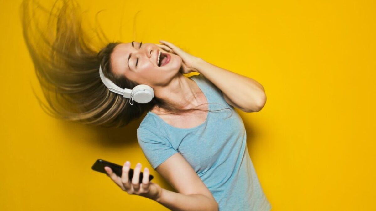 woman wearing white headphones