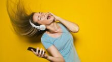 woman wearing white headphones