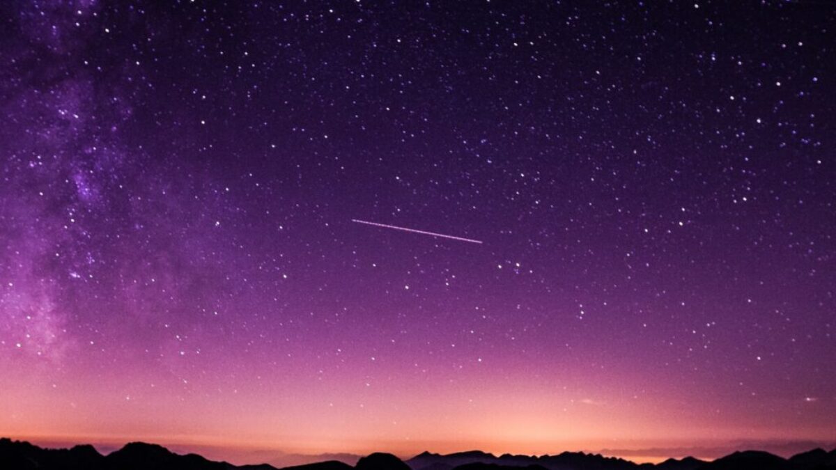 silhouette photo of mountain during night time