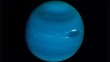 Neptune on a black background