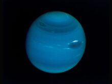 Neptune on a black background
