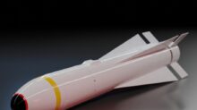 white and red space ship scale model