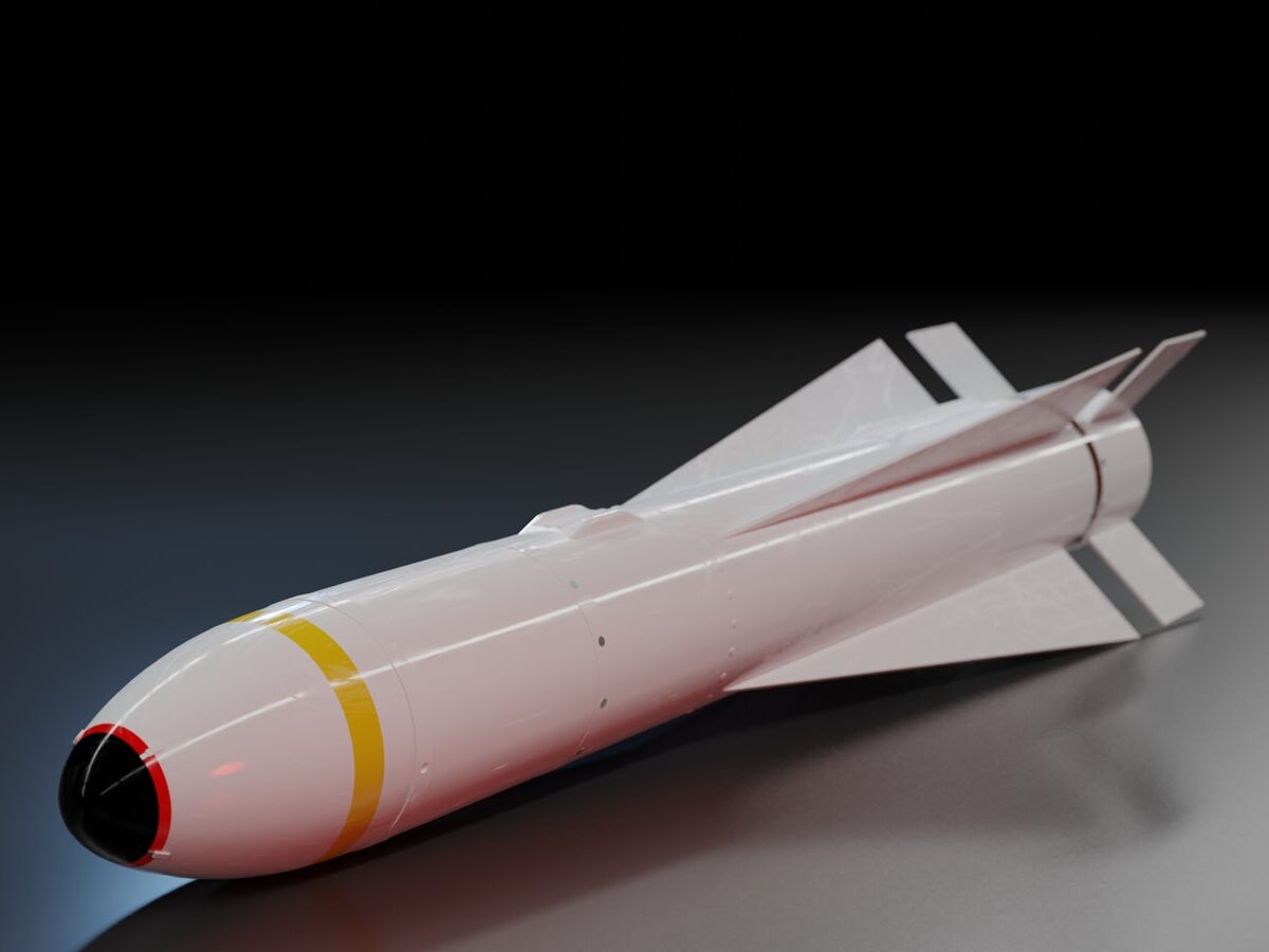 white and red space ship scale model