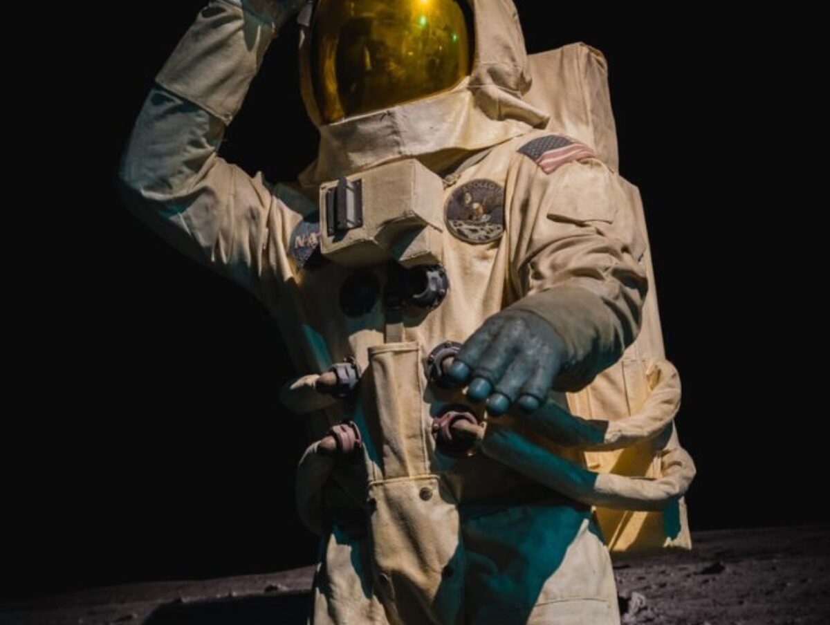 person in brown and black suit wearing brown helmet