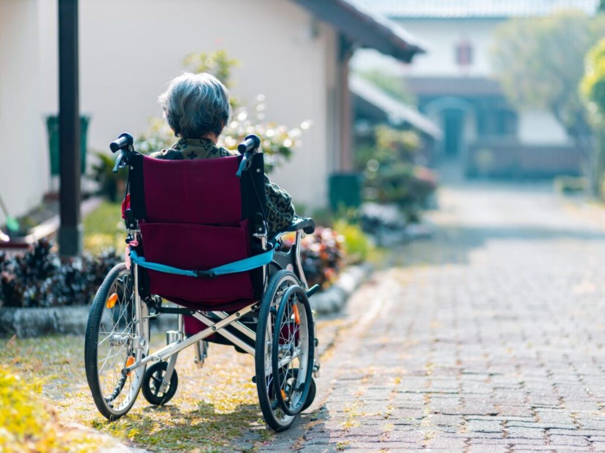 woman sitting on wheelchair