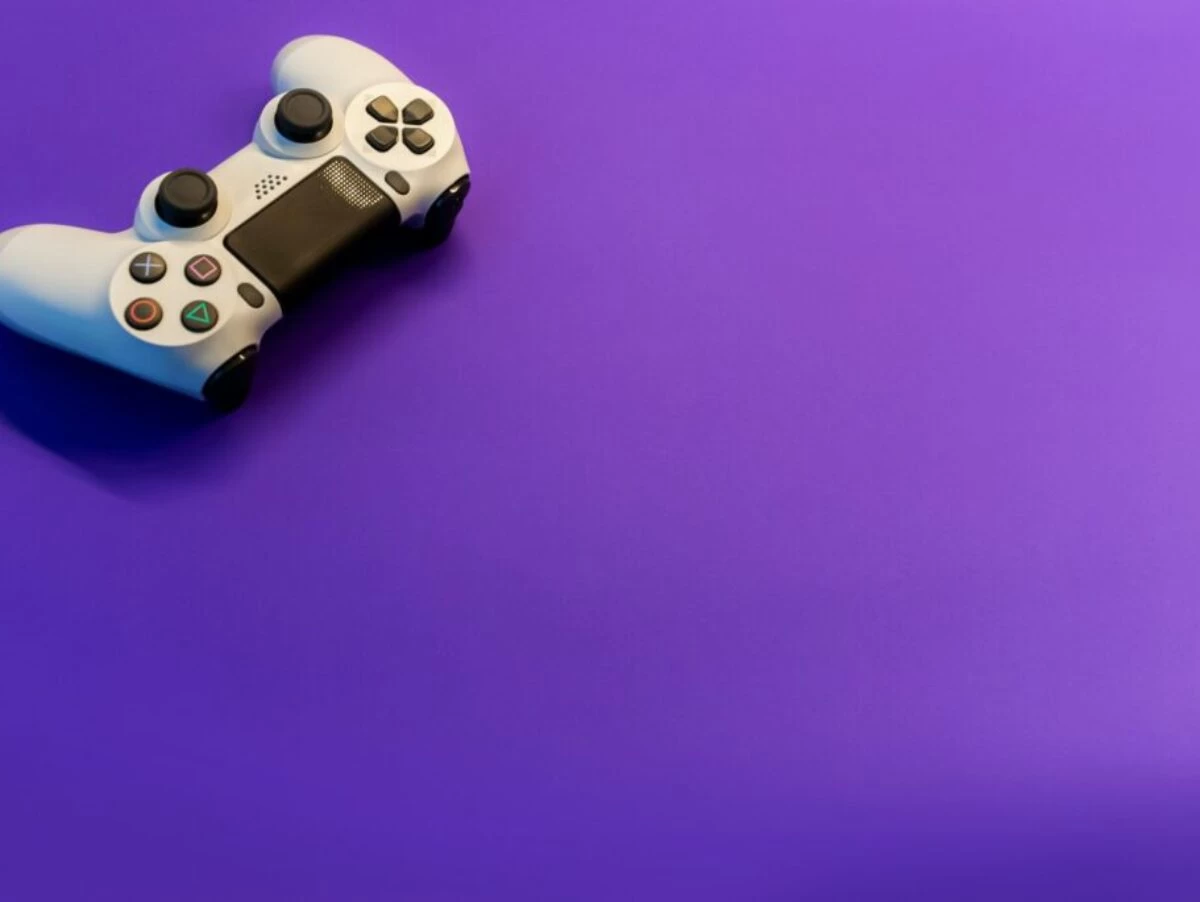 white and black game controller