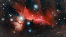 red and black galaxy with stars