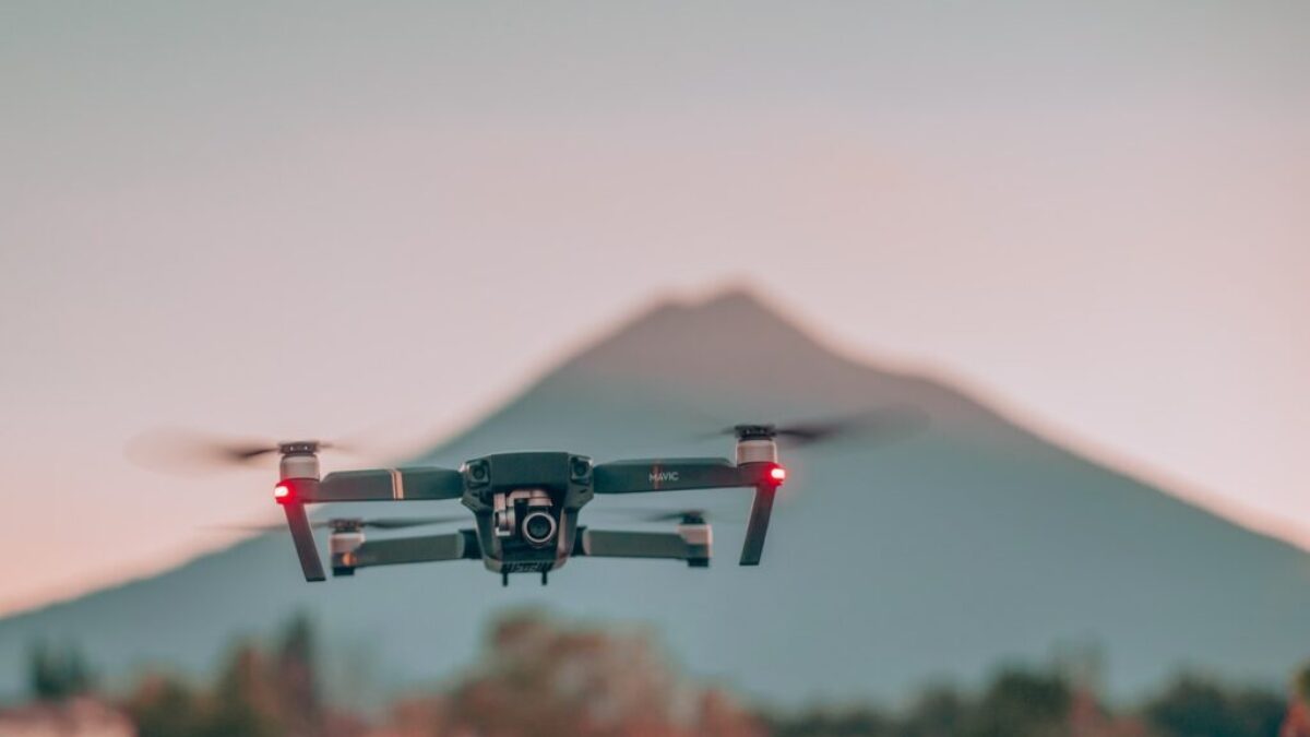 drone in mid air during daytime