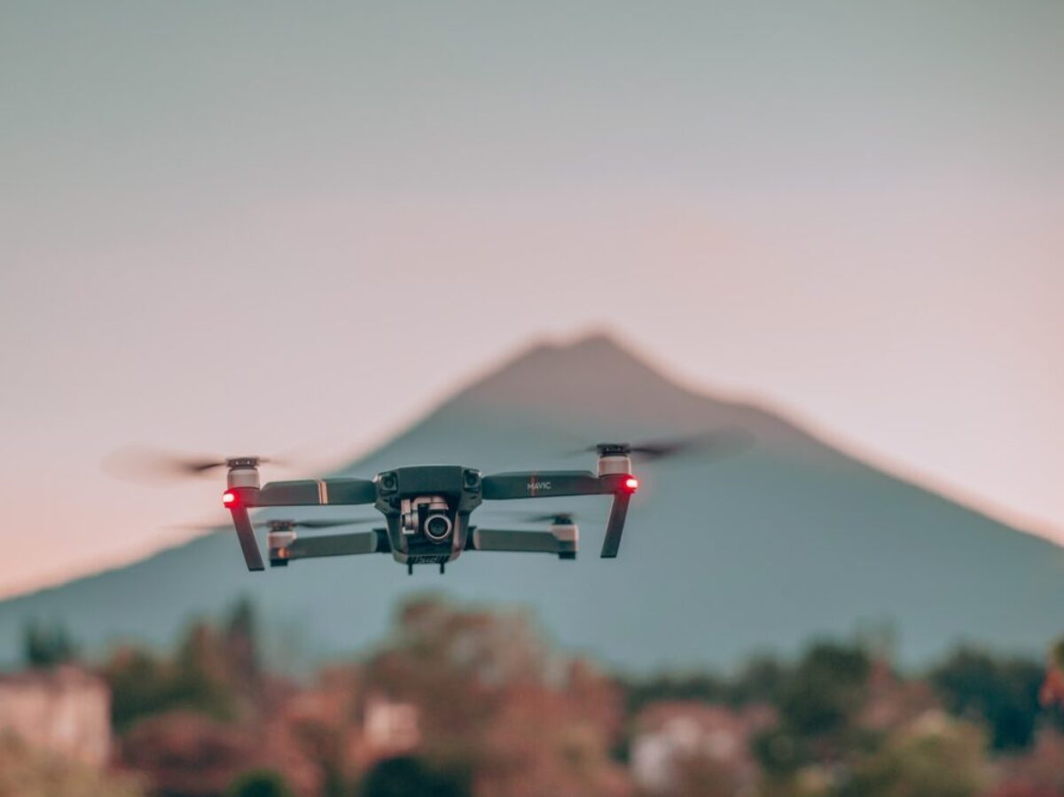 drone in mid air during daytime