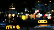 shallow focus photography of Taxi signage