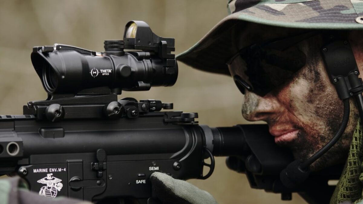 man in woodland camouflage uniform using sniper rifle