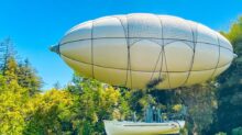 white and gray round balloon