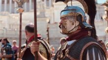 people wearing medieval costumes during day