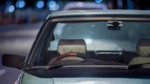 selective focus photograph of blue vehicle