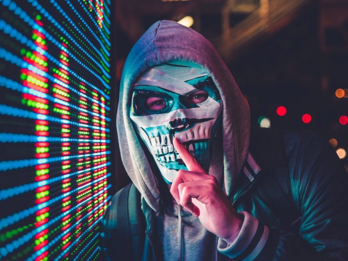 person standing near LED sign