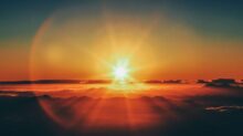 calm body of water during sunset