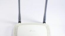 white and black tp link wireless router
