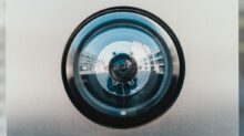 selective focus photography of lens
