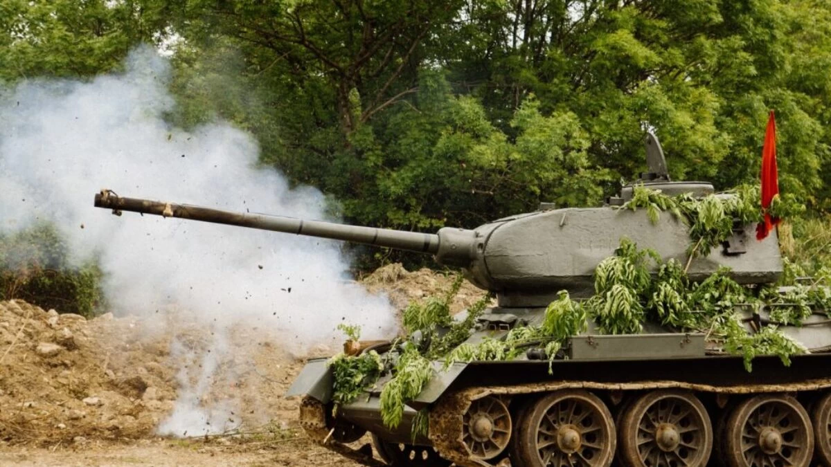 green battle tank on brown soil