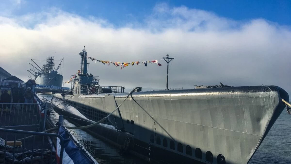 gray ship beside dock