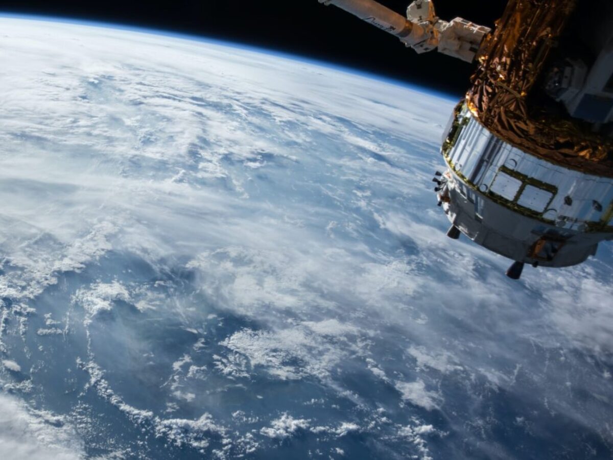 view of Earth and satellite