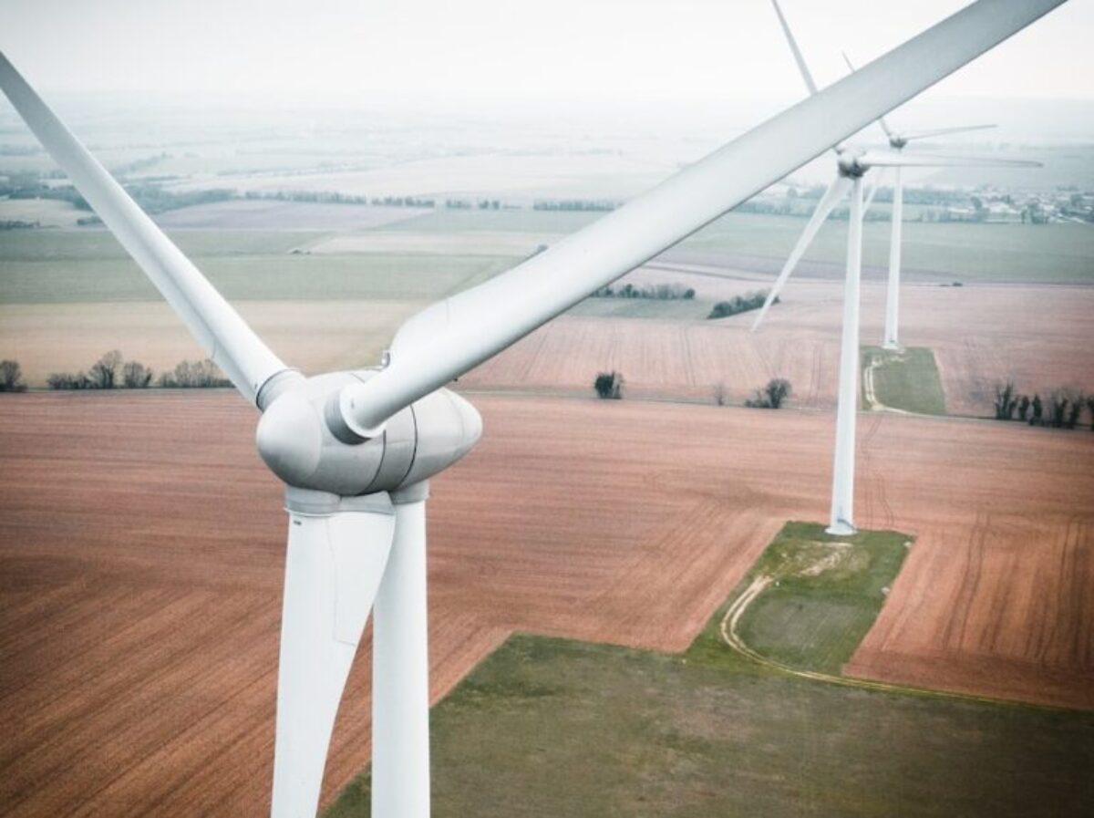 three white windmill during daytime