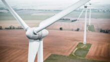 three white windmill during daytime