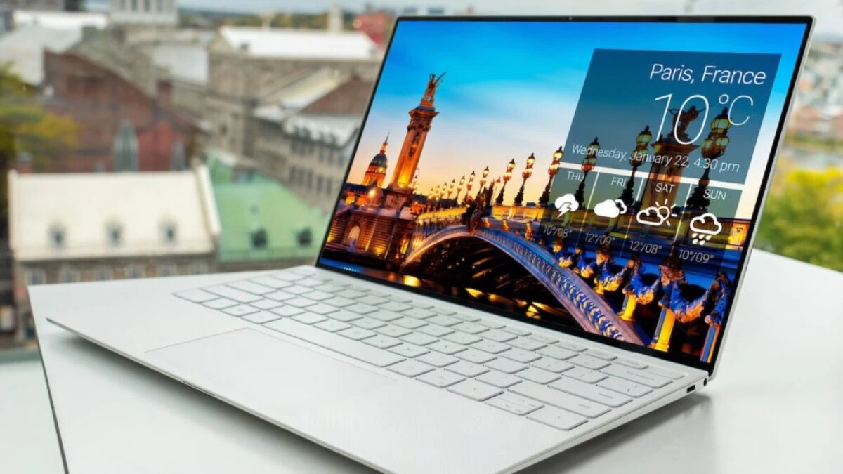 laptop on white table
