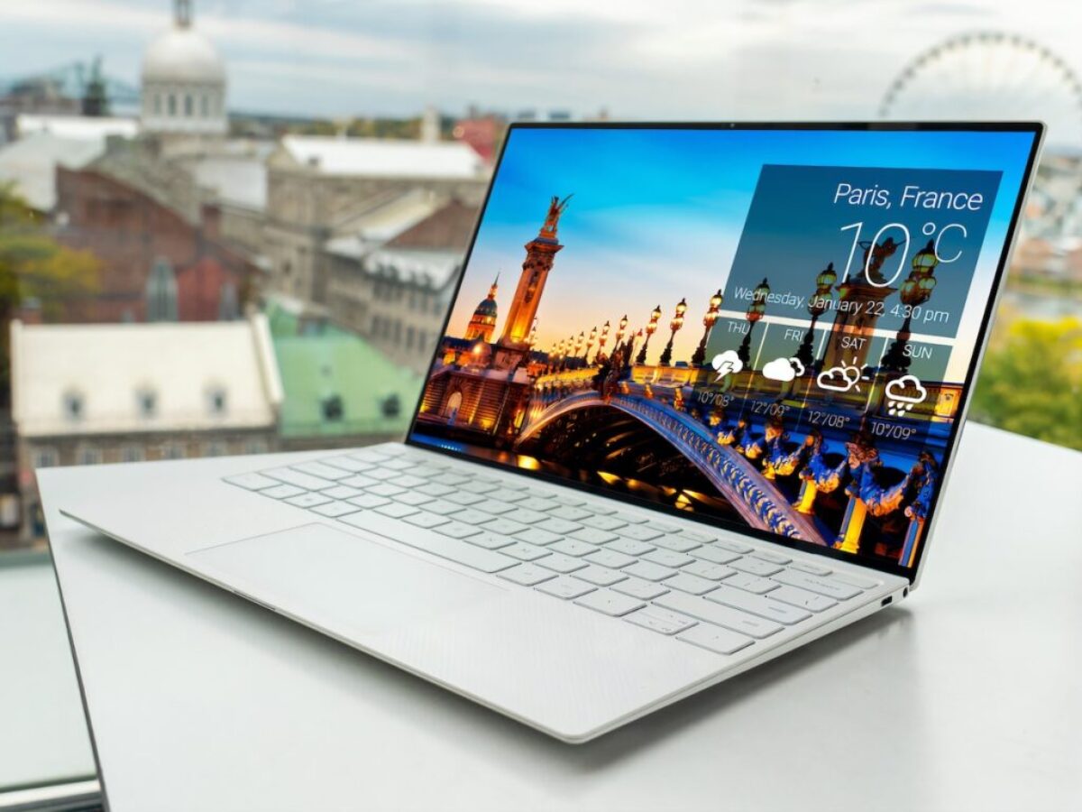 laptop on white table