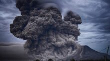 volcano eruption during daytime