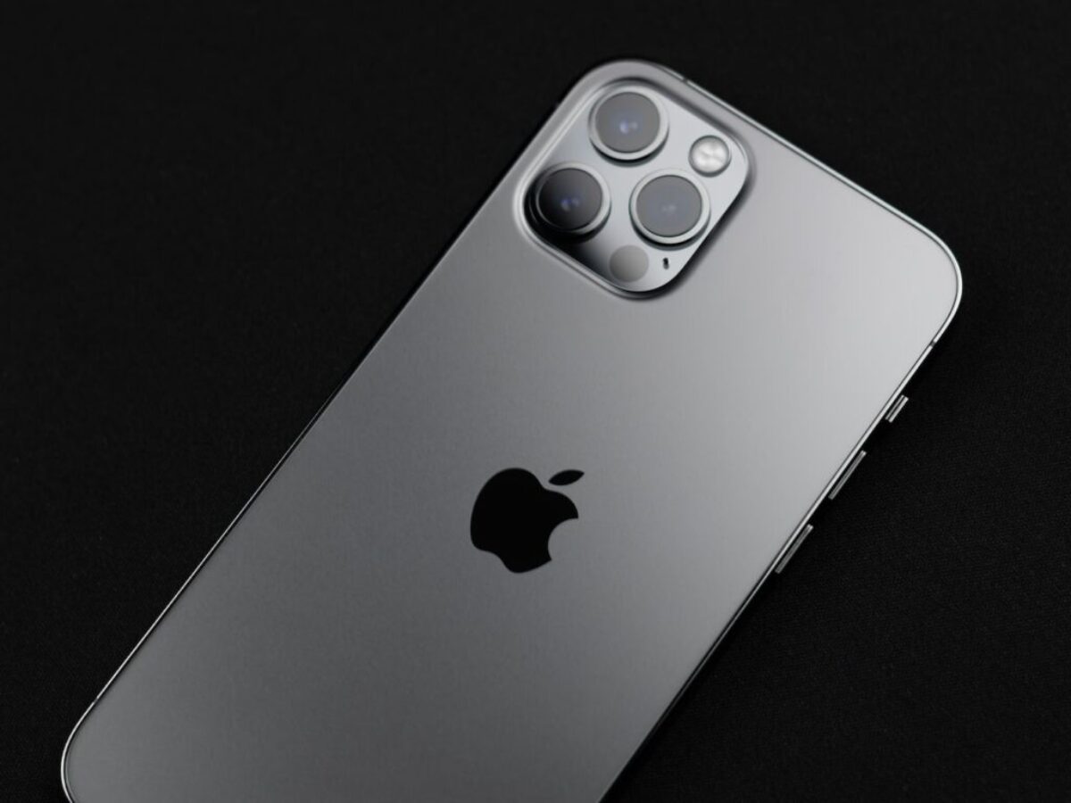 silver iphone 6 on black surface