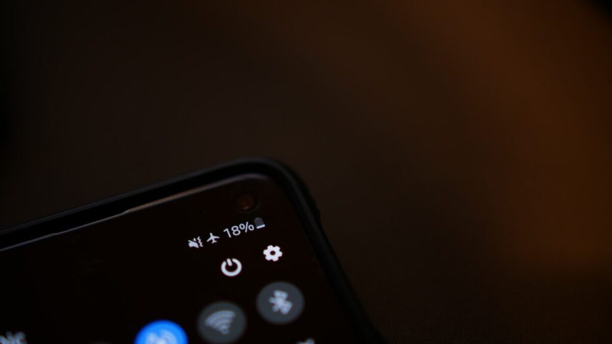 black remote control on white surface
