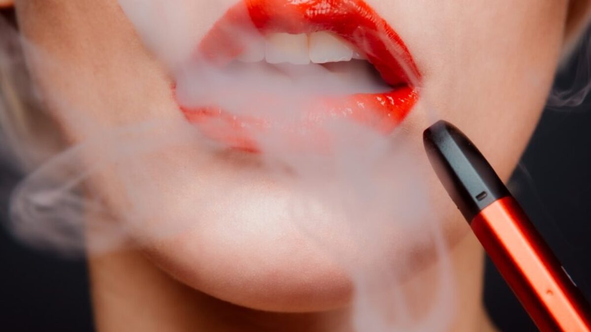 woman with red lipstick and red lipstick