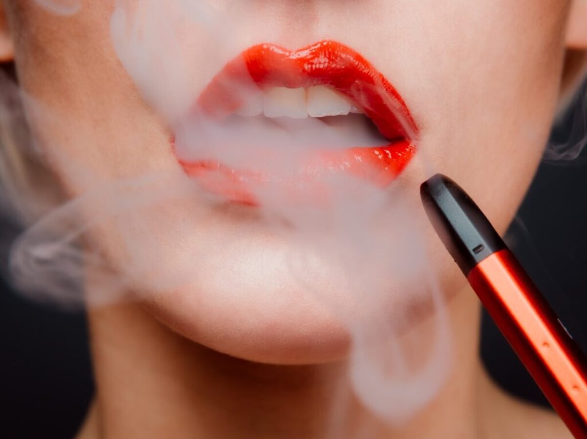 woman with red lipstick and red lipstick