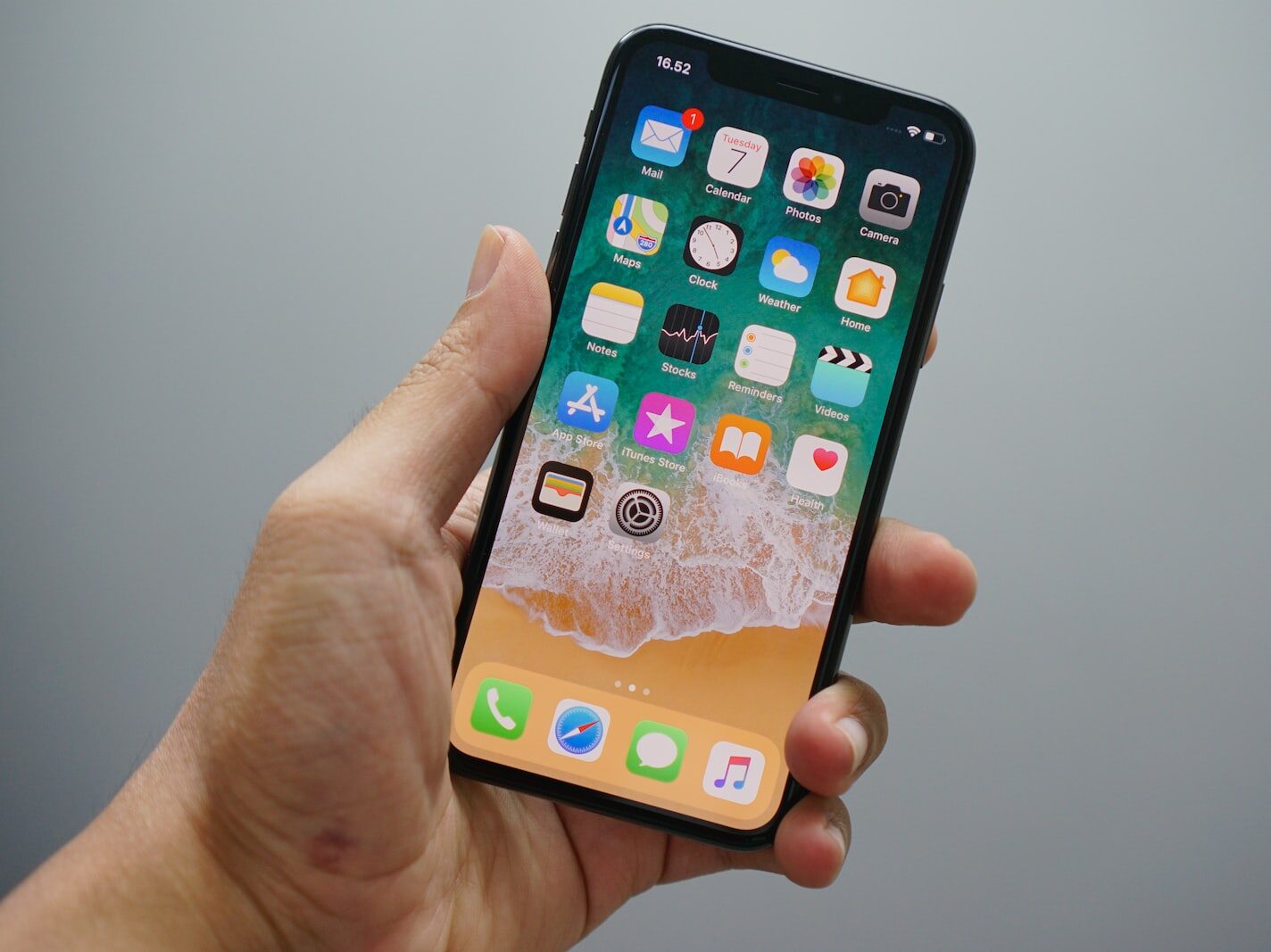 person holding space gray iPhone 7