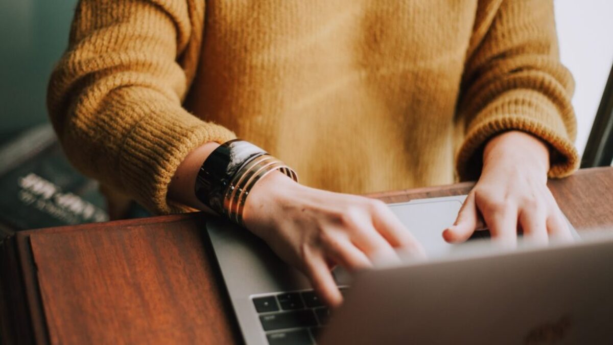 person using laptop computer