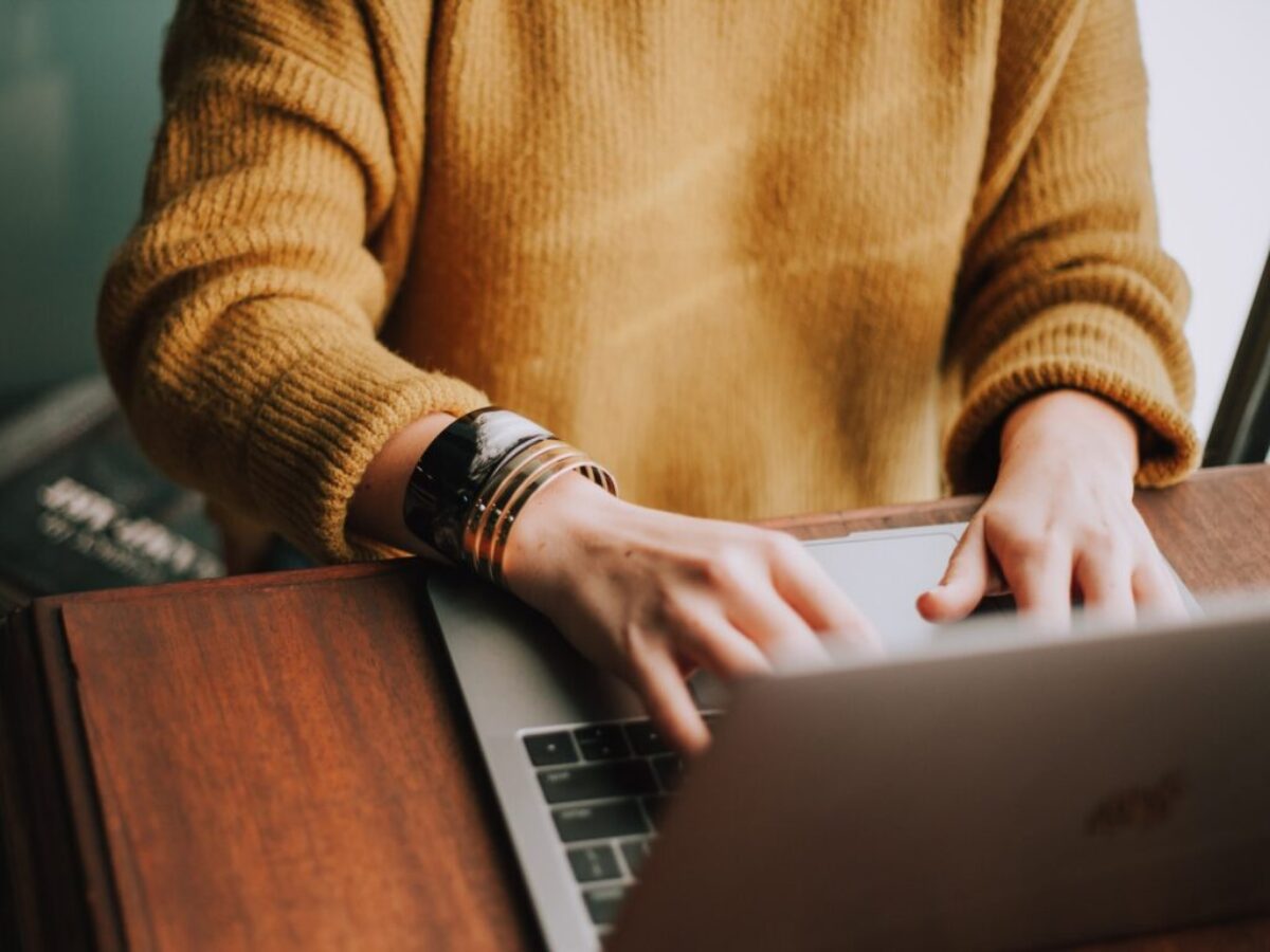 person using laptop computer